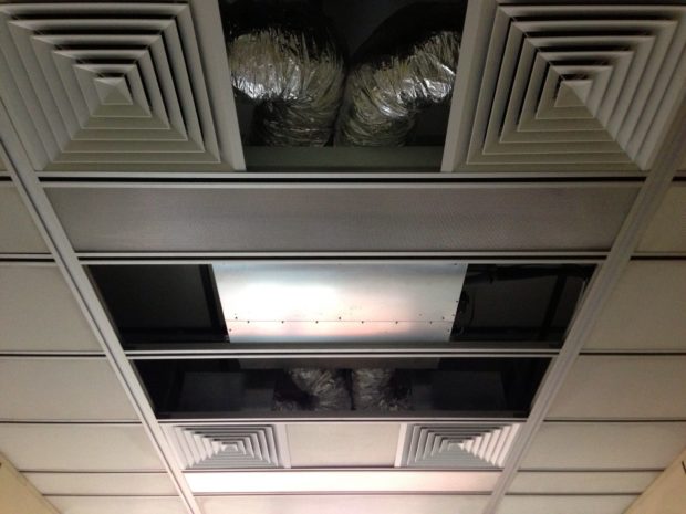 Air conditioning vents in ceiling.